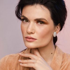 The Stellar Glow: Domed Oval Pavé Studs